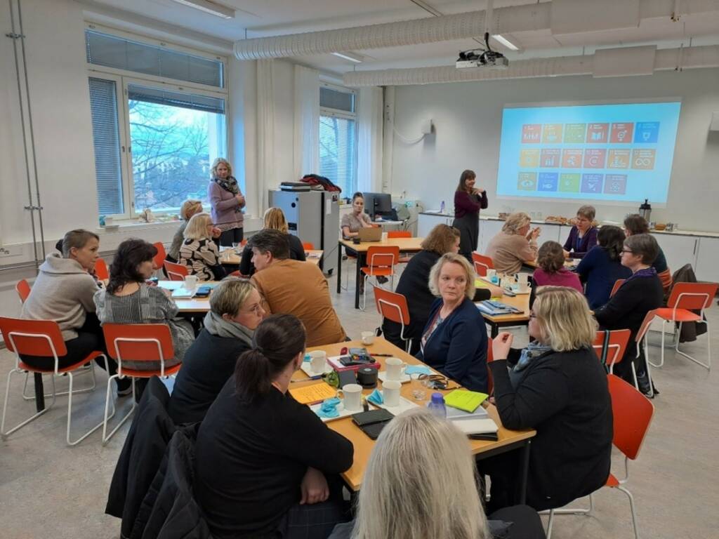 Teachers gathered in a classroom for a workshop.