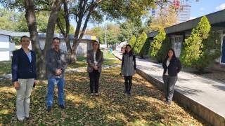 UAA project team under the tree