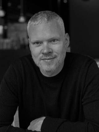 black and white picture of Olli Pyyhtinen