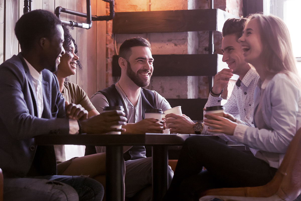 Kuvituskuva nuorista kahvilla. Young people having coffee.
