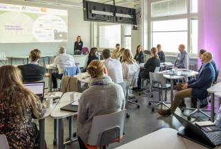 People in a classroom.