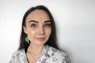 Photo of dark haired woman.