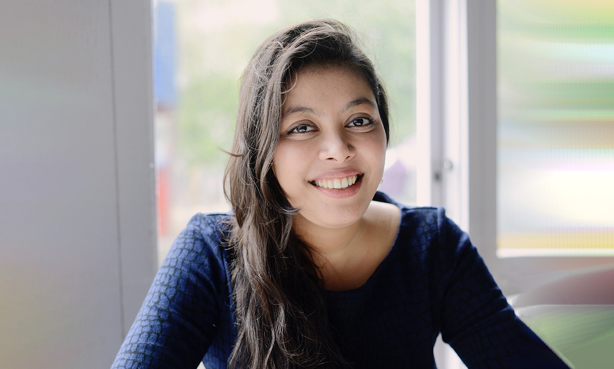 Young woman smiling.