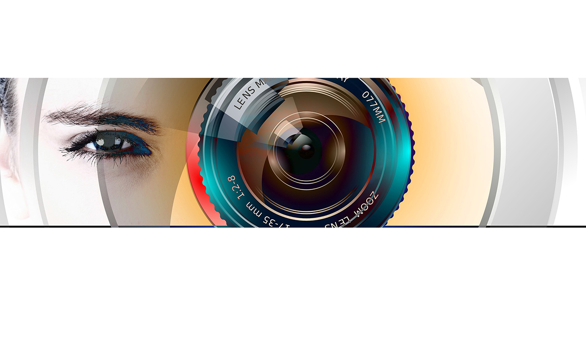 Silmä ja kameran objektiivi