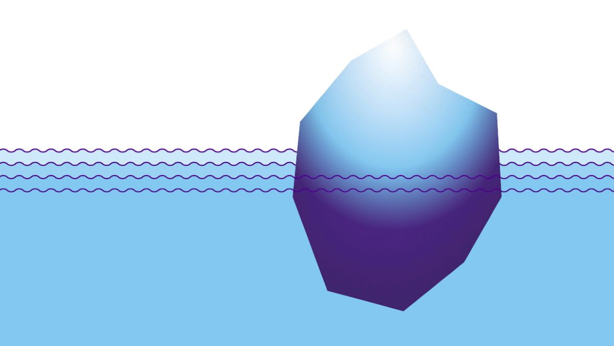 Sininen meri, jossa kelluu jäävuori.