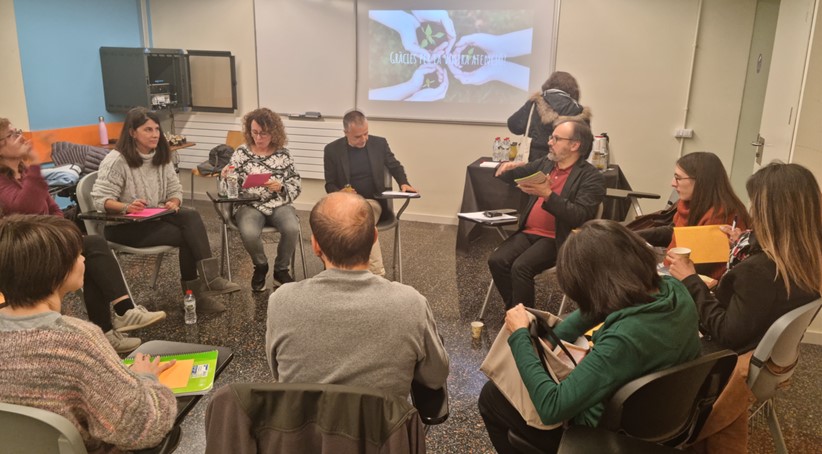 People working in a classroom.