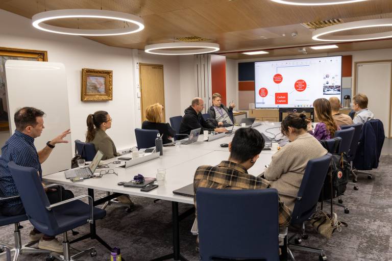 Photo of group market researchers at results presentation