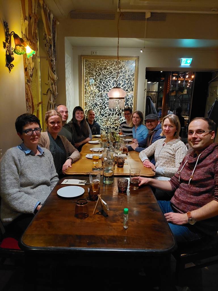 Project members and guests at a restaurant