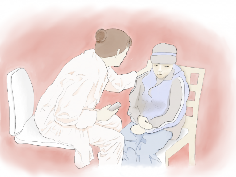 A doctor is touching a child-patients shoulder.