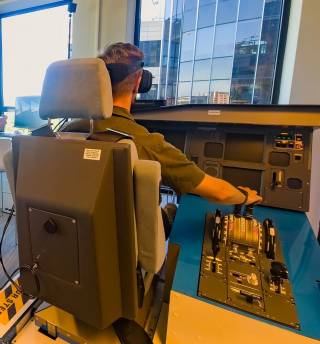 A man testing XR based flight training simulator.