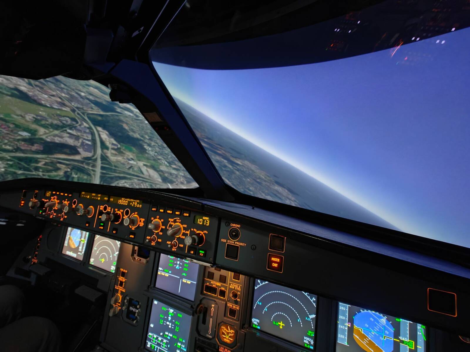 A view through the windscreen of a flight simulator.